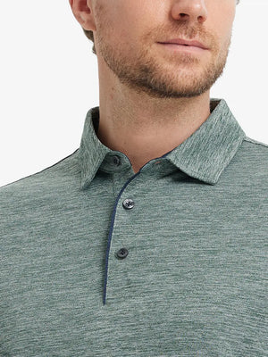 Close-up of Modern Fit Melange Polo front (nose to chest) in TURQUOISE HEATHER, showing vibrant melange texture.
