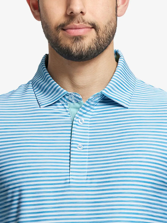 Close-up from nose to chest of BLUEBIRD WHITE polo featuring vibrant watercolor stripe design