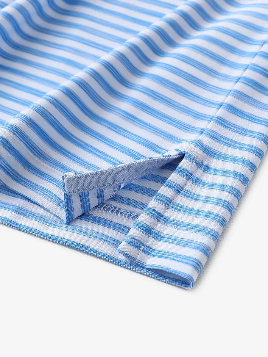 Close-up of hem slit detail on POWDER BLUE WHITE Unique Watercolour Stripe Polo