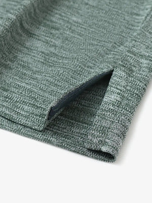 Close-up of hem opening on Modern Fit Melange Polo in TURQUOISE HEATHER, highlighting quality stitching.