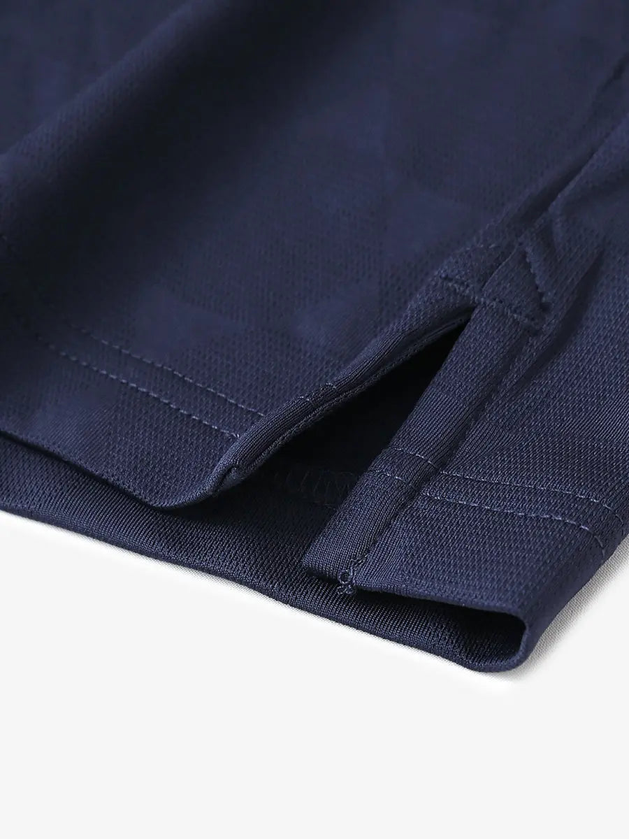 Close-up detail of hem opening on Modern Texture Stylish Polo in NAVY.