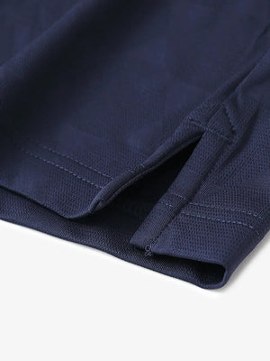 Close-up detail of hem opening on Modern Texture Stylish Polo in NAVY.