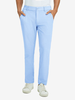 Front lower body view of model with hand in pocket, wearing quick dry casual dress pants in light blue.