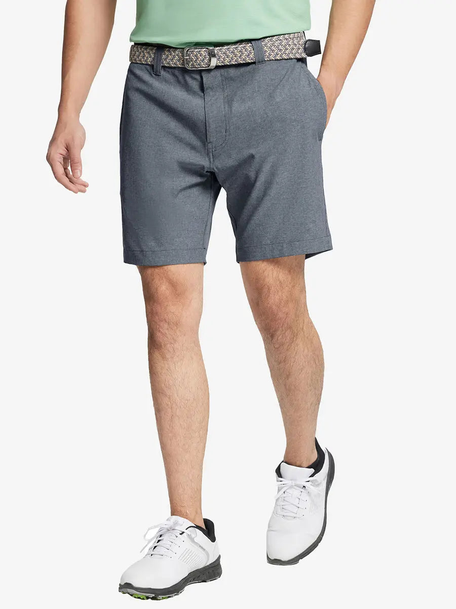 NAVY 7 Inch Heather Performance Golf Shorts with front view, model's lower body and side pockets visible