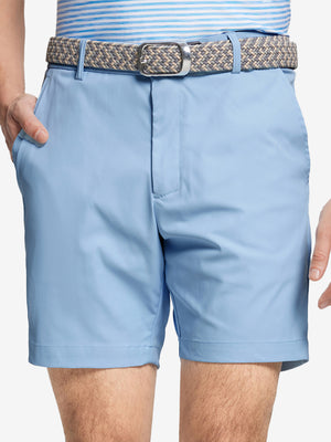 Front waist to knee view of light blue water resistant golf 7 inch shorts, clean athletic fit.