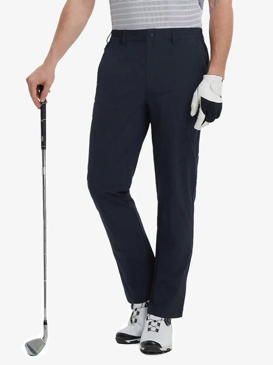 Front lower leg view of Performance Water Resistant Pants in NAVY，model holds golf club in right hand.