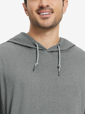 Close-up from nose to chest, showing soft heather texture and collar detail of the grey melange hoodie.