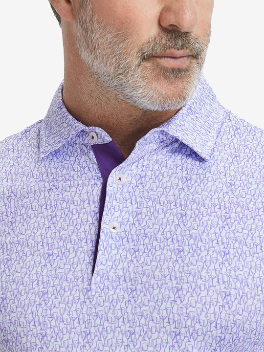 Close-up from nose to chest, showing collar and fabric pattern detail of the purple wine glass polo shirt.