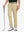 KHAKI Water Resistant Everyday Pants front view, model's lower body holding a golf club