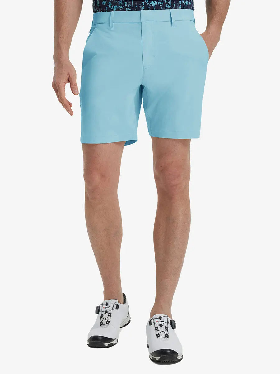 Front view of model’s lower body with hands in pockets, wearing Player Fit Versatile Solid Shorts 7 Inch – LIGHT BLUE