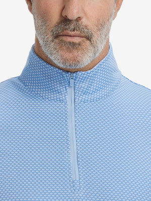 Close-up of collar area on jacquard quarter zip pullover in light blue, highlighting refined jacquard detail.