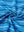 Close-up of classic blue stripe stylish stripe jersey golf polo fabric showing smooth texture and breathable knit.