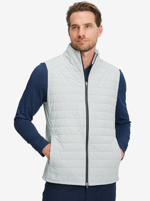 Model wearing Lightweight Water Resistant Puffer Vest in light grey heather, upper body front view