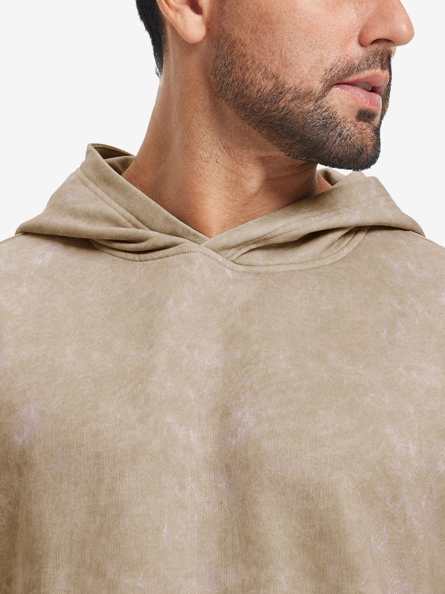 Close-up of neckline and drawstring area of the exclusive print kangaroo hoodies in khaki brown.