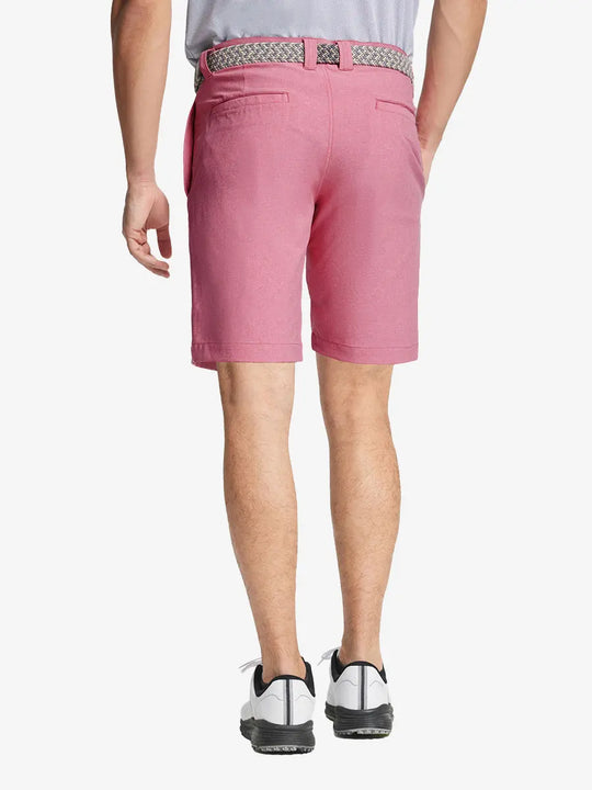 PINK 9 Inch Heather Performance Golf Shorts back view, model's lower body with hands in pockets