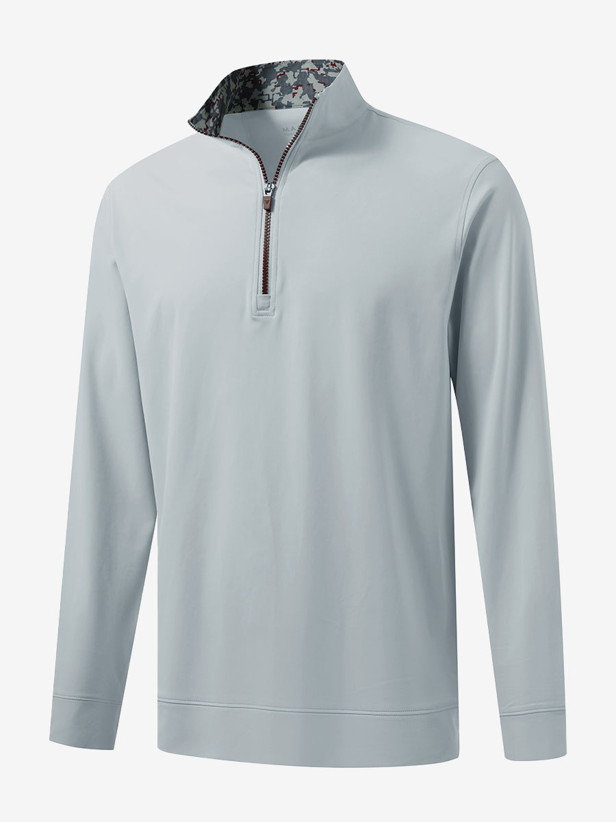 3D front view of the lightweight golf quarter zip pullover in misty grey, clean and athletic design.