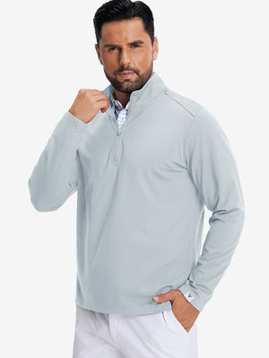 Model front upper body wearing Fleece lined golf quarter zip with sleek grey mist look
