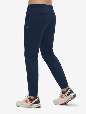 Back view of navy superion softness mesh joggers with zipper pockets