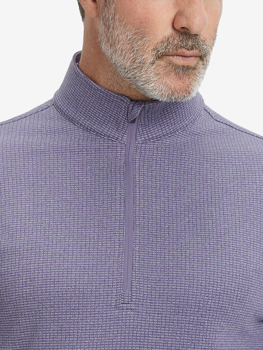 Close-up of collar and fleece lining on casual fleece lined quarter zip pullover in purple.
