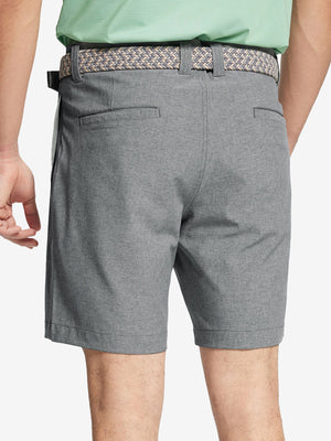 Back view of youth in light grey Heather Performance Golf Shorts, highlighting rear design and fit