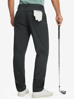 Model holding a golf club with one hand, back lower body shot wearing grey thermal water repellent fleece dress pants