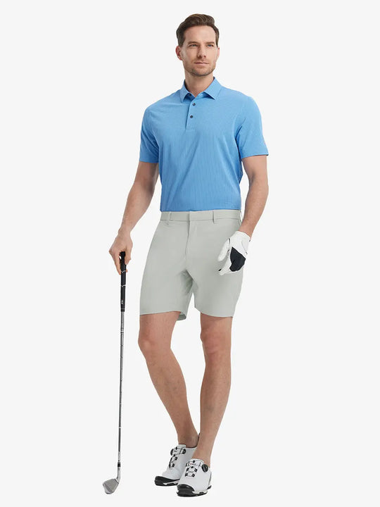 Full-body front shot of model holding golf club, wearing Player Fit Versatile Solid Shorts 7 Inch – GLACIER GREY