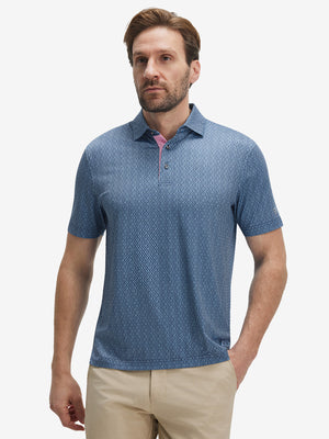 Male model front upper body wearing Performance quick dry print golf polos, sleek light blue navy circles look