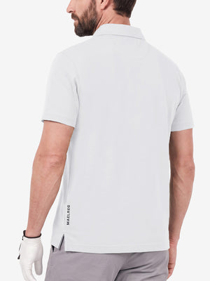 Back upper body shot of model wearing white  ultra-comfort slim fit roma knit polo shirts