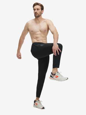 Model wearing black superion softness mesh joggers with zipper pockets in motion