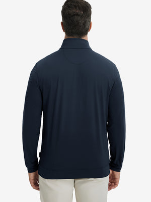 Back upper body view of the navy lightweight golf pullover, model turns head slightly with ease.