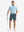 Full-body front view of model wearing the grey blue stretch soft flat front dress golf shorts for a complete look