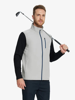 wearing the silver gray windproof golf vest, holding a golf club, showcasing its sleek design and functional pockets