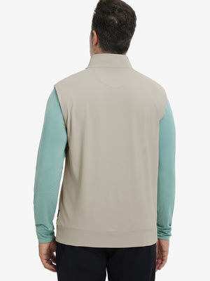 Back upper body view of the khaki light print collar quarter zip golf vest, clean cut and relaxed posture.