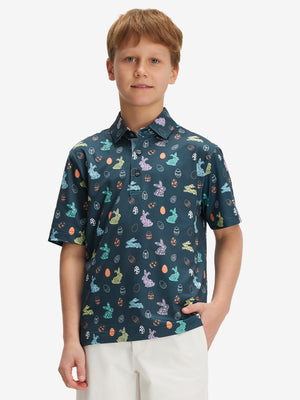 Front half-body of boy in easter bunny eggs performance print boys golf polo