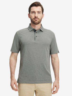 Front half-body view of a model wearing the black feather weight jacquard polo shirts, showing the chest pocket