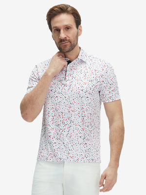 Front half-body shot of model wearing the white polka dots 4 way stretch print collared polo shirt for a casual sporty look