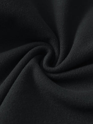 Close-up of the fabric of women's stretch fleece lined water resistant joggers in black, highlighting the fleece lining.