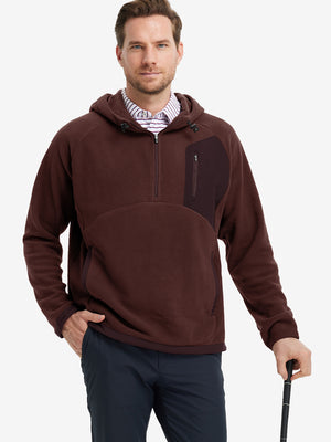 Model holding a golf club, dressed in Wine Red Quarter Zip Polar Fleece Sweatshirt, sporty fit.