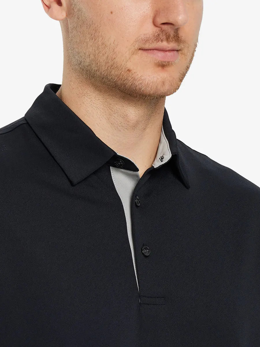 Model front close-up from nose to chest wearing BLACK Ventilated Pique Performance Polo