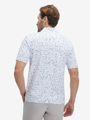 Back half-body view of model wearing the blue navy dot 4 way stretch print collared polo shirt, highlighting the rear silhouette