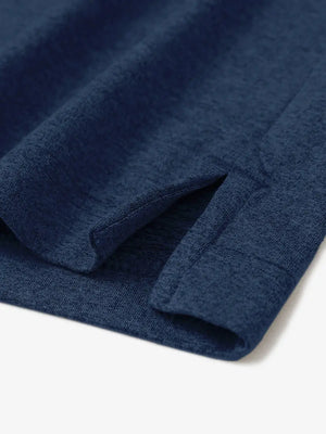 Cobalt Heather Skin-friendly Long Sleeve Melange Polo – close-up detail of side hem slit
