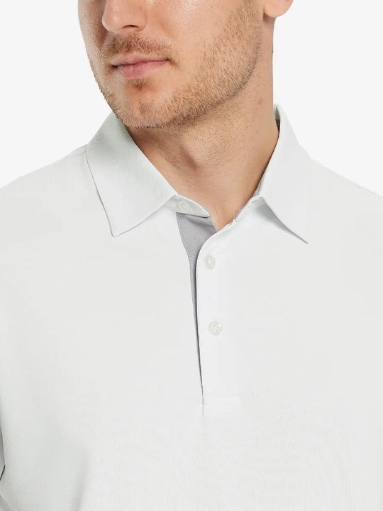 Model front close-up from nose to chest wearing CREAM Ventilated Pique Performance Polo