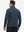 Back upper view of model wearing jacquard quarter zip pullover in grey/navy, showing clean seam lines.
