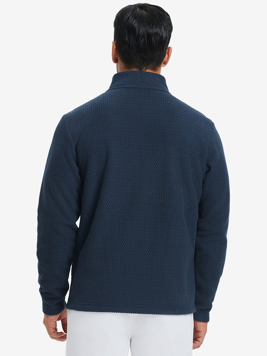 Back upper view of model in soft winter fleece jackets, showing shoulder fit and fleece texture in navy.