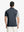 Back half-body view of model in DARK GREY Moisture Wicking Color Block Polo Shirt.