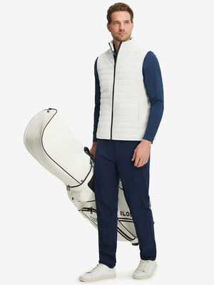 Model wearing Lightweight Water Resistant Puffer Vest in white, holding golf club