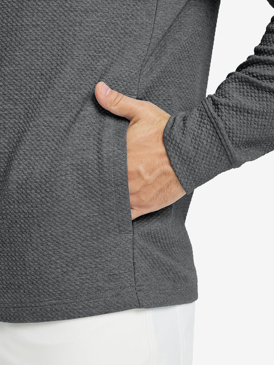 Close-up of pocket detail, single hand inside texture solid hoodies pullover, casual style in grey heather.