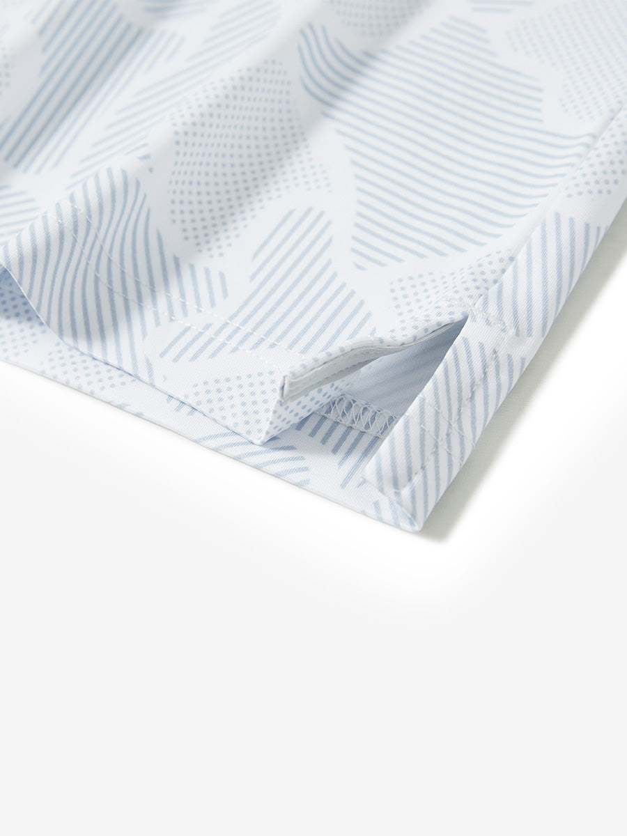 Hem slit detail of the light gray irregular pattern lightweight print long sleeve polo, showing fine stitching and finish.
