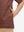 Detail shot of pocket on coffee brown water-resistant short sleeve q-zip hoodie for boys