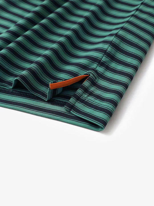 Close-up of hem slit detail on Turquoise Navy Yarn Dyed Stripe Polo